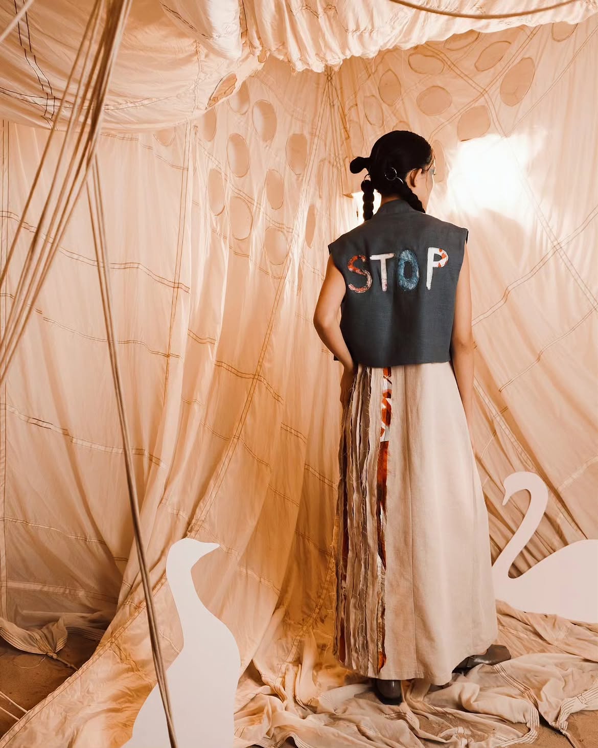 Look 14 — "SOS: water"