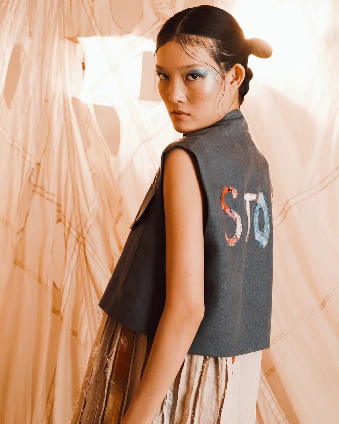 Look 14 — "SOS: water"